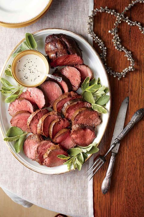 Since beef tenderloin doesn't have much fat, it can easily become dry and overcooked. For tender slices, don't cook past a meat thermometer registering 130° in the center. Grits And Greens, Best Christmas Dinner Recipes, Christmas Dinner Recipes Easy, Christmas Dinner Recipes, Christmas Main Dishes, Mustard Cream Sauce, Easy Christmas Dinner, Christmas Buffet, Condiment Recipes