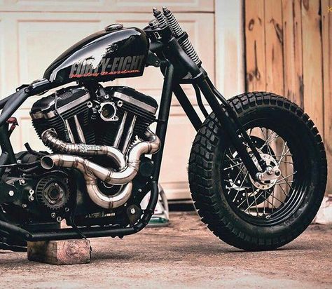 A springer front end and very intricate and cool exhaust on a custom Sportster FortyEight. Harley Forty Eight, Springer Front End, Harley 48, Harley Davidson 48, Mochila Jansport, Sportster 48, Мотоциклы Harley Davidson, Hd Sportster, Sportster Bobber