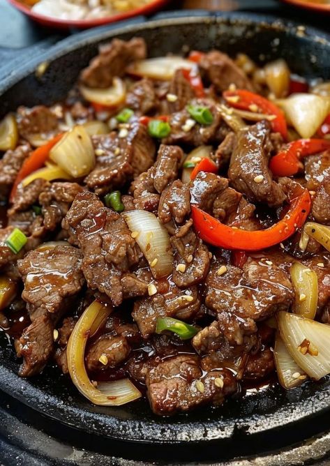 Savor the sizzling flavors of Chinese Pepper Steak with Onions! Quick, easy, and loaded with savory goodness—perfect for busy weeknights. #QuickDinner #ChineseCuisine #PepperSteak #StirFry #SavoryFlavors Cube Steak Chinese Recipes, Chinese Beef And Pepper Stir Fry, Onion Pepper Steak, Chinese Steak And Peppers, Pepper Steak Stir Fry Recipe, Chinese Beef And Peppers, Chicken Pepper Steak, Recipes With Scallions, Sizzling Chinese Pepper Steak With Onions