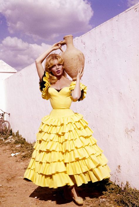 Brigitte Bardot style: a Spanish-inspired yellow dress from the '60s. Bridgette Bardot, Lee Radziwill, Spanish Dress, Bridget Bardot, Marianne Faithfull, Bardot Style, Gina Lollobrigida, Movie Actress, Liza Minnelli