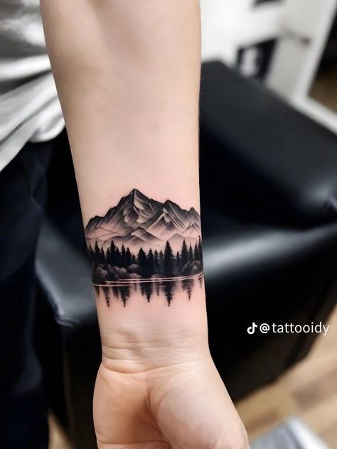 Forest Wrist Tattoo Guys, Disconnected Tattoo Sleeve, Arms Cover Up Tattoo, Wrist Forest Tattoo, Outdoor Half Sleeve Tattoo For Women, Tattoo Script Cover Up, Mountains Cover Up Tattoo, Mountain Tattoo Cover Up Ideas, Wild Fire Tattoo