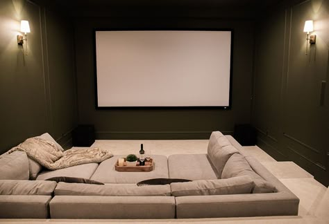 Theater Room Renovation - The Arched Manor - Arched Manor Cellar Cinema Room, Aesthetic Media Room, Home Theater Pit Couch, Floor Seating Theater Room, Green Theatre Room, Pit Couch Media Rooms, Green Cinema Room, Green Theater Room, Movie Room Couch Deep Sofa