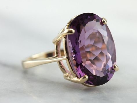 "This simple vintage cocktail ring features a super deep purple Amethyst in the center, one that really flashes and flickers with vibrant violet reflections!  Set into a lovely vintage mounting that is utter simplicity, this vintage ring is a beautiful addition to anyone's collection! Metal: 14K Yellow Gold  Gem: Amethyst 10.04 Carats  Gem Measurements: 12.2 x 17.3 mm, Oval  Ring Size: 5.75 Marks: \"@ RSA 14K\" Stamped on the inside band SKU #:  45Y3KF-N Each piece has been identified and graded Texture Jewelry, Yellow Gold Sapphire Ring, Amethyst Ring Vintage, Yellow Gold Cocktail Ring, Right Hand Ring, Princess Jewelry, Vintage Cocktail Ring, Gold Cocktail Ring, Diamond Jewelry Designs