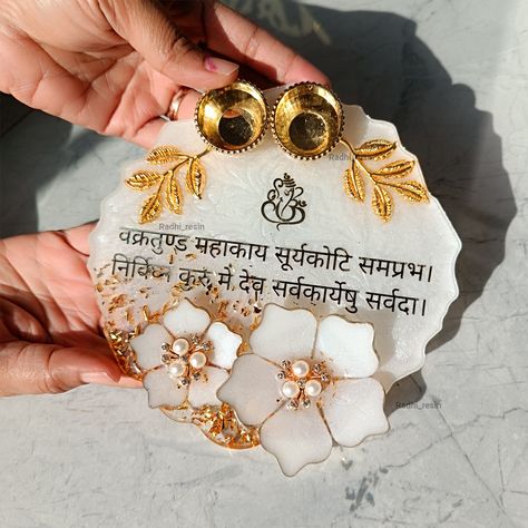 Pooja Thali Beginner Resin Kit A Price : 849/- Rs Including in Pooja Thali Resin kit - 6 Inch Agate and 3D Flower Mould - Resin 300 Grm 2:1 - Gold Flakes - White Pearl Powder - Ganesha Mantra - 2 Metal Leaf - 2 Katori - 2 Metal Ganesh Order on Whatsapp : 8200425601 Website : www.resinstoresurat.com All types of silicon moulds, clock materials, all pigments like opaque, pearl, alcoholic etc.all type of glitters, resin necessary things, pressed flowers, diy kit, resin and hardener, insert sh... Resin Pooja Thali, Ganesha Mantra, Pressed Flowers Diy, How To Make Resin, Pooja Thali, Flower Molding, Pearl Powder, Metal Leaves, Resin Kit