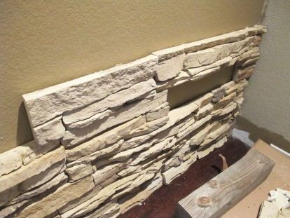 How to Install Faux Stone on a Inside Wall | Hometalk Painted Stair Railings, Peel And Stick Stone, Stone Wall Living Room, Wine Walls, Faux Stone Veneer, Living Room Big, Wine Cellar Ideas, Stacked Stone Fireplaces, Faux Stone Walls