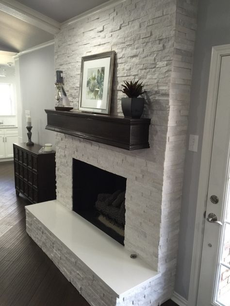 Fireplace makeover: Crystal White Quartzite 6x24 Interlocking Ledger Panel Modern Farmhouse Fireplace, Design Camino, White Brick Fireplace, Stacked Stone Fireplaces, Fireplace Redo, Painted Brick Fireplaces, White Quartzite, Brick Fireplace Makeover, Fireplace Mantel Decor