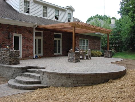 Landscaping Stairs Sloped Yard Diy, Interlock Around Pool, Concrete Patio On Sloped Yard, Sloped Backyard Patio, Raised Concrete Patio Ideas, Raised Paver Patio, Tiered Patio, Concrete Patio Designs, Sloped Yard