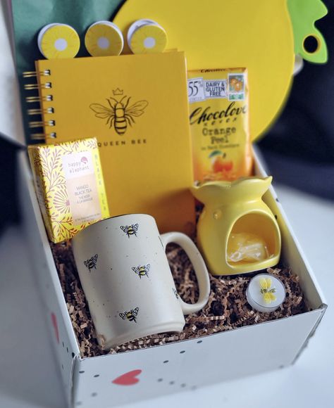 Gift box includes:
- Hard cover Journal - Queen Bee
- Bee Mug
- The Wax Melt Warmer with candle and wax
- Chocolate Bar
- Lemon Cutting Board
- Kitchen Clips
- Pack of Tea
- Complimentary personalized card Gift Basket For Sister, Basket Birthday Gifts, Bee Themed Gift Basket, Honey Gift Basket Ideas, Honey Themed Gift Basket, Bee Gift Basket, Birthday Gifts Box, Bee Themed Gift Basket Sign, Honey Gift Basket