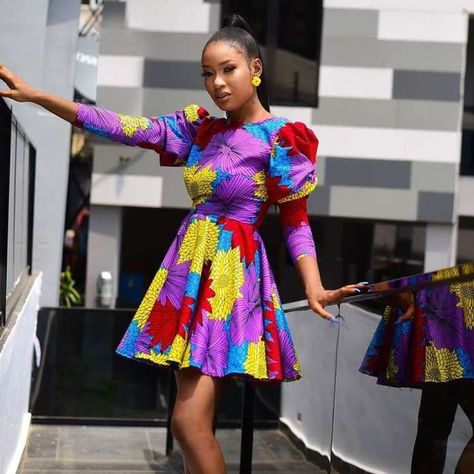 Ankara Gown With Cap Sleeve Simple Short Ankara Gowns, Ankara Styles For Teenage Girl, Women Ankara Gown, Short Gown Ankara Styles, Simple Ankara Gowns, Gown Ankara, Midi Dress Wedding, Midi Dress Wedding Guest, African Party Dresses