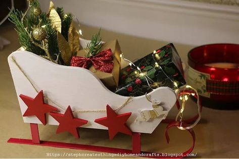 DIY Target Wood Sleigh Upgrade | Hometalk Wooden Sleigh Diy, Christmas Sleigh Decorations, Wood Sleigh, Wood Sled, Wooden Sleigh, Simple Decorating, Candy Tree, Christmas Vinyl, Holiday Wrapping Paper