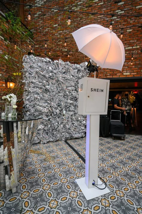 Shein and Les Do Makeup Launch Party, silver photo booth backdrop Modern Photo Booth Backdrop, Launch Party Gift Bag Ideas, Corporate Photo Booth Ideas, Digital Photo Booth, Makeup Activation, Pop Up Photo Booth, Silver Foil Backdrop, Silver Photo Backdrop, Creative Photo Booth Ideas Events