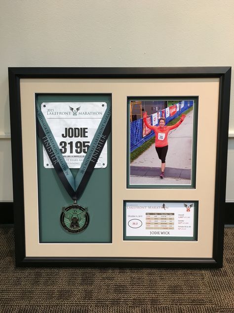 Marathon mementos Running Shadow Box Ideas, Medal Framing Ideas, Marathon Frame Medal Displays, Marathon Shadow Box Ideas, Medal Frames Ideas, Diploma Wall Decor, Race Medal Displays, Diy Trophy, Marathon Medal Display