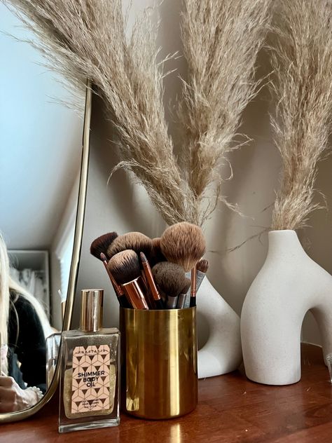 Home decor clean girl aesthetic neutral home decor pampas grass vanity modern home decor Vanity Modern, Shimmer Body Oil, Aesthetic Neutral, Neutral Home Decor, Clean Girl Aesthetic, Neutral Home, Vanity Decor, Clean Girl, Pampas Grass