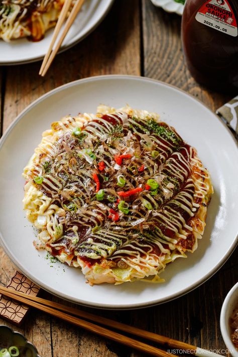 Okonomiyaki is a savory Japanese cabbage pancake “grilled as you like it“ with your choice of protein and tasty condiments and toppings. My recipe for this popular Osaka street food includes the 6 key ingredients that give it a truly authentic taste. Japanese Cabbage, Osaka Street, Okonomiyaki Recipe, Japanese Street Food Recipes, Just One Cookbook, Japanese Ginger, Ginger Pork, Japanese Soup, Japanese Street Food