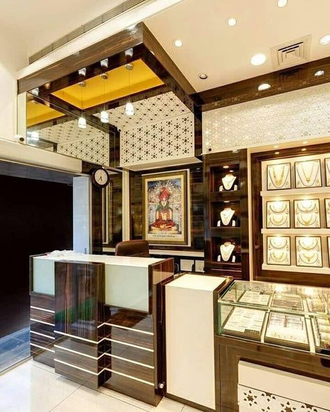 Modern Jewelry Store Interior, Jewellery Showroom Interior Design, Shop Counter Design, Jewelry Showroom, Jewelry Store Displays, Plan Garage, Jewelry Store Interior, Display Visual Merchandising, Jewellery Shops