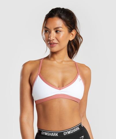 IT’S NOT YOU, IT’S YOUR SPORTS BRA With lightweight, breathable designs, comfortable cups and supportive straps, you can rely on our sports bras to be there for you, and for yours. • Personalise your look by mix and matching the removable bra straps • Lower coverage SIZE & FIT • Low support • Body fit • Model is 5'8" and wears a size XS MATERIALS & CARE • 78% Polyester, 22% Elastane SKU: B3A2J-WCJ8 Cute Gym Outfits Shorts, Gym Outfits Shorts, Gymshark Minimal, Gym Outfit Shorts, Women Gym Outfits, Cute Comfy Clothes, Cute Sports Bra, Gym Jacket, Gym Bra