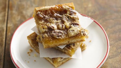 These pecan pie bars are an adaptation of a winning Bake-Off® contest recipe. This version has 43% less sugar and contains 10% fewer calories than the full-sugar version. Pecan Bar, Pecan Bars Recipe, Pecan Pie Bars Recipe, Easy Dessert Bars, Pillsbury Crescent, Fall Pies, Pie Bar Recipes, Pecan Bars, Pillsbury Recipes