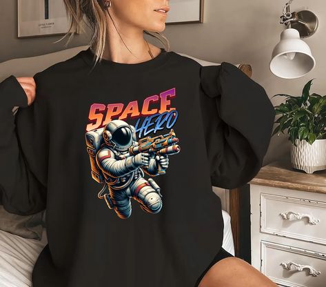 Space Hero Sweatshirt, Outer Space Hoodie, Space T-shirt, Sci-fi, Astronaut sweatshirt, Astronaut hoodie, Sweatshirt gift for nerds, Gifting by ShyraStore on Etsy Space Hero, Astronaut Design, Nerd Gifts, Retro Inspired, Science Fiction, Sweat Shirt, Comfort Fit, Favorite Outfit, Gender Neutral