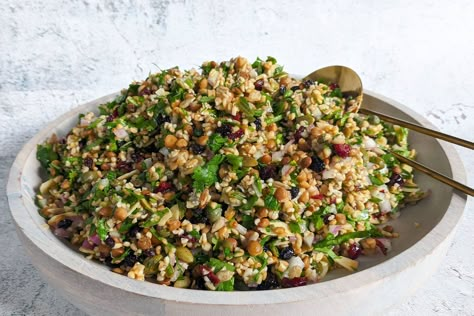 With so many textures and flavours, this vibrant Cypriot salad is packed full of ancient grains, nuts, seeds and dried fruits, all finished off with a zingy caper lemon dressing. Custard Croissant, Crunchy Salad Recipes, Croissant Pudding, Christmas Coconut, Grain Salad Recipes, Filling Salad Recipes, Wreath Recipe, Pumpkin Spinach, Christmas Pasta