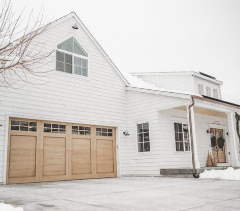 cb28 White House With Cedar Garage Doors, Oversized Garage Doors, White House Garage Doors, White House With Wood Garage Doors, White House Wood Garage Door, Garage Doors White House, Garage Doors On White House, Wood Garage Doors White House, Wood Look Garage Doors