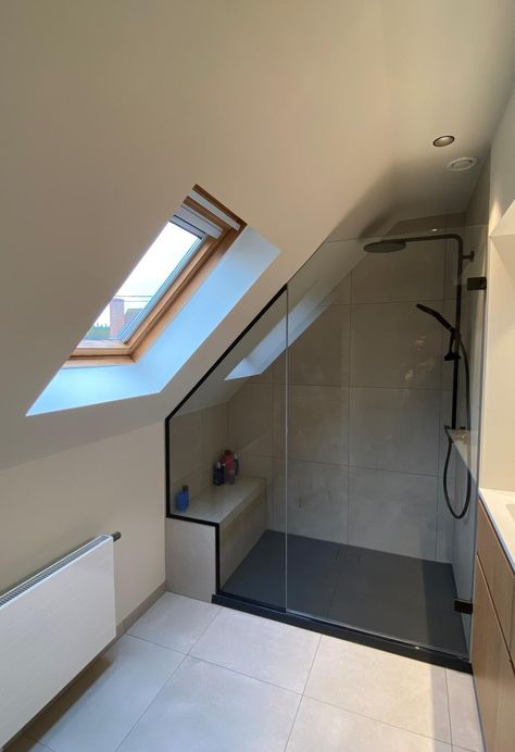 Shower In Sloped Ceiling, En Suite Sloping Ceiling, Shower Attic Bathroom, Shower On Slanted Ceiling, Attic Bathroom Skylight, Attic Conversion Bathroom, Bathroom In Eaves Small Spaces, Small Bathroom Under Roof, Sloped Roof Bathroom Ideas