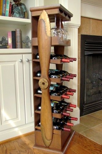 Tall Wood Airplane Propeller Wine Rack | A Simpler Time Aviation Bar, Airplane Furniture, Aviation Room, Dad Presents, Aviation Furniture, Building Shelves, Wood Airplane, Wood Props, Airplane Propeller