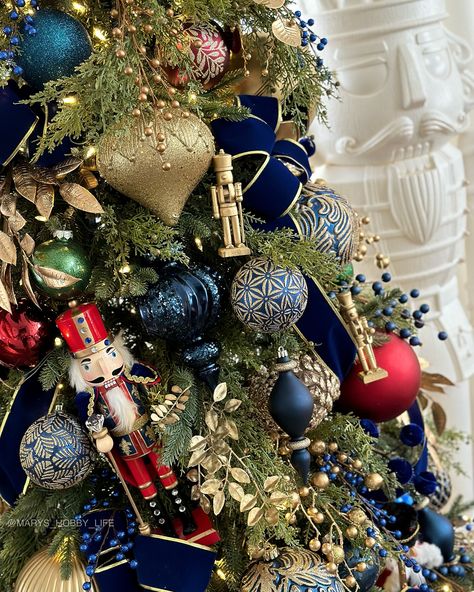 2024 Nutcracker Christmas tree💙💚❤️! The film Nutcracker and The Four Realms was the inspo for this tree. I love this film by @disney and could have done more with all the themes in the movie but we just stuck with solid jewel tone traditional colors this year from the film poster. When I saw those ornaments @walmart I knew I had to get them for our tree this year! I went early in October to find those giant nutcrackers too because we know they always sell out! I’m leaving it white this yea... Nut Cracker Christmas Tree Theme, The Nutcracker Ballet Christmas Decor, Nutcracker Christmas Tree Theme Ideas, Nutcracker Wedding Theme, Nutcracker Tree Theme, Nutcracker Christmas Tree Ideas, Nutcracker Themed Christmas Tree, Nutcracker Tree, Nutcracker And The Four Realms