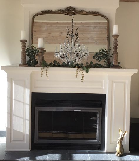 Oval Mirror Fireplace Mantle, Big Mantle Decor, Mirror Inside Fireplace, Mirror Above Fireplace Mantle Farmhouse, Mirrors Above Fireplace Ideas, Large Picture Over Fireplace, Horizontal Mirror Over Fireplace, Mantle With Large Picture, Vintage Modern Fireplace Decor