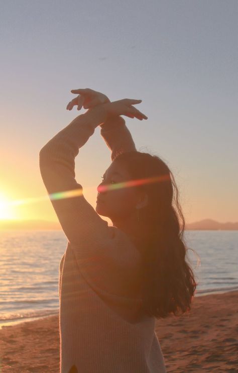 Arms Above Head Pose, Pose At The Beach, Star Filter, Ballet Dance Photography, Dance Pose, Beach At Sunset, Sun Flare, Blue Ripped Jeans, Tan Sweater