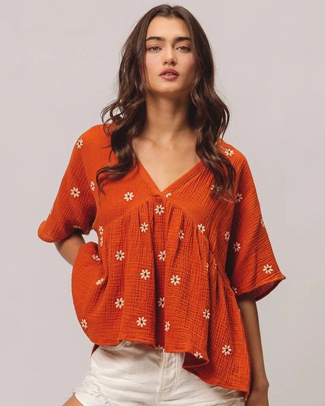 Let your style blossom with our Rust Oatmeal Floral Embroideries Crinkle Gauze Peplum Top. The dainty floral embroidery adds a playful touch to this airy and breezy top. Whether you’re out and about or just chilling, this top will definitely make you stand out! ☀️ www.ullala.ca #shopwithus #shoplocal #didsbury #shopthelook #didsburyboutique #stylehaul #destinationdidsbury #shopdidsbury #wearwhatyouwant #shoplocaldidsbury #ullalaboutique #styleinspo #fashioninspo #boutique #pinterestinspo ... Peplum Top Outfits Indian, Peplum Top Outfits Casual, Peplum Top Outfits, Cotton Short Tops, Cotton Tops Designs, Print Shirts Women, Just Chilling, Linen Shirt Dress, Trendy Fashion Tops