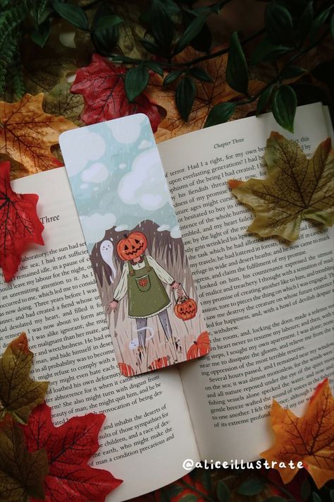 Pumpkin Friend Bookmark Perfect for fans of all things Autumn, Fall Aesthetic, Ghosts, Pumpkins, Spooky Cute, Halloween and reading books! Printed on heavyweight 350gsm 100% Recycled Card. These bookmarks are made from paper that is FSC certified and 100% recycled and also is recyclable. Measuring 55mm x 148mm with rounded corners. Double sided: One side has a full length illustration, the back has a sparser image with an Aliceillustrate logo at the bottom. (See photos for images of both sides) Cute Autumn Aesthetic, Pumpkin Bookmark, Cozy Books, Aesthetic Illustration, Drawing Now, Cute Autumn, Spooky Cute, Halloween Pumpkins Carvings, Pumpkin Halloween Decorations