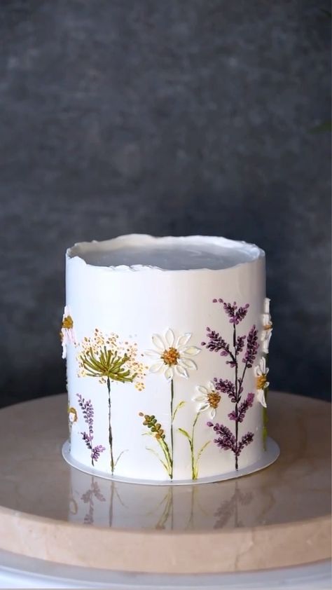 Painted Flower Cake Tutorial, Buttercream Wildflower Cake, Wild Flower Cake Design, Wildflower Sheet Cake Ideas, Flowers On Side Of Cake, Minimal Flower Cake, Wedding Cake Piped Flowers, Wildflower Wedding Cake Simple, Wild Flower Birthday Cake