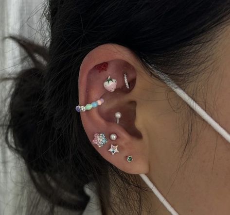 Japanese Ear Piercings, Ear Styling Ideas, Rock Piercing Ear, Ear Piercings Dark Aesthetic, Punk Piercings Ears, Ear Piercing Sets Grunge, Ear Piercing Set Up Goth, Ariel Hair, Snake Bites