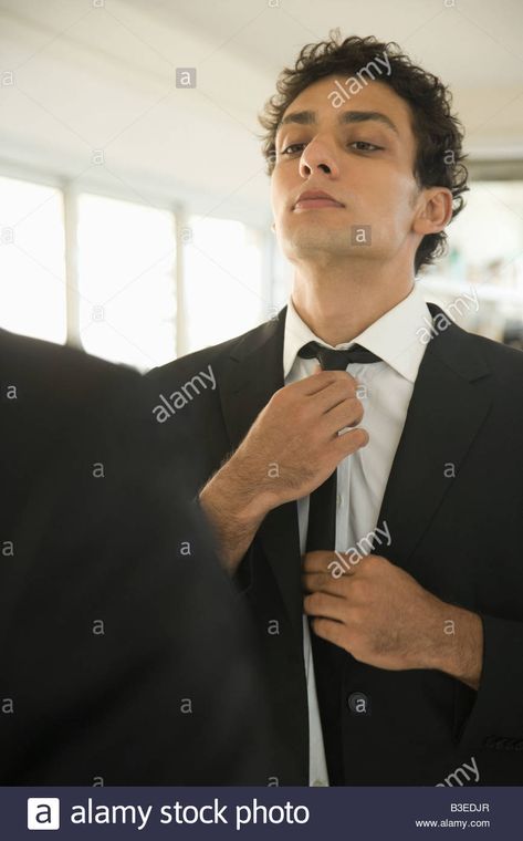 guy fixing his tie Man Fixing Tie Reference, Adjusting Tie Pose, Man Adjusting Tie, Fixing Tie Pose, Suit And Tie Men, Cristiano Ronaldo Young, Tie Drawing, Sketchbook Art, Photography Poses For Men