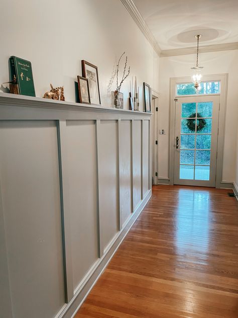 Diy board and batten wainscoting. Painted trim. Greige trim. Valspar Nostalgia Gray. Board And Batten Wall With Different Color Trim, Wall Trim Entryway, Diy Wainscoting Entryway, Living Room Waynes Coating Wall Colors, Greige Wainscoting, Picture Frame Wainscoting Ideas, Wainscoting Mudroom Entryway, Board And Batten With Picture Rail, Board And Batten Wall In Hallway