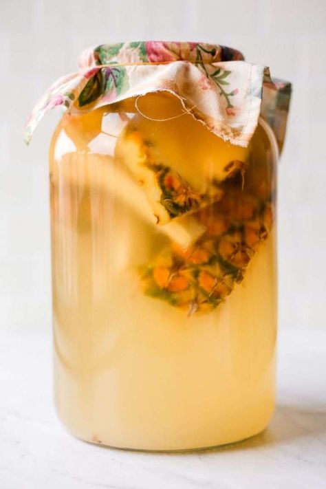 My easy pineapple vinegar recipe requires only four ingredients: pineapple scraps, sugar, raw vinegar for a starter culture, and water. This is the perfect recipe to use up pineapple scraps. Pineapple Vinegar Recipes, Pineapple Scraps, Pineapple Vinegar, Homemade Vinegar, Fruit Vinegar, How To Make Vinegar, Fire Cider Recipe, Green Tomato Recipes, Raw Apple Cider Vinegar