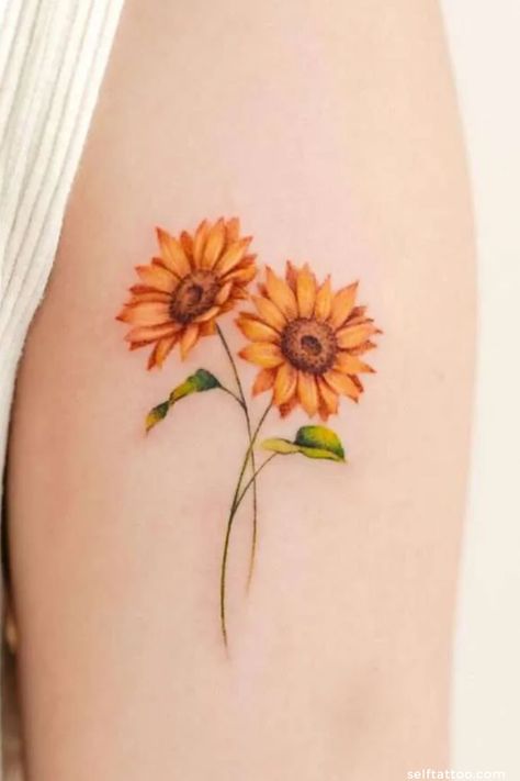 Unveil the meaning behind sunflower tattoos and find your perfect ink inspiration with our collection of ideas. From shoulder to sleeve designs, explore colorful and minimalist options for women. Dive into our article for small and simple fine line tattoos that capture the essence of these radiant flowers. Line Sunflower Tattoo, Sunflower Arm Tattoo, Fine Line Sunflower, Fine Line Sunflower Tattoo, Yellow Tattoo Ink, Sunflower Tattoo Meaning, Self Tattoo, Green Tattoos, Favorite Tattoos