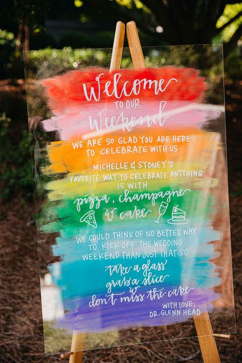 Information Signage, Wedding Welcome Sign Ideas, Rainbow Wedding Decorations, Welcome Sign Ideas, Rainbow Wedding Theme, Unicorns And Rainbows, Curated Wedding, Wooden Welcome Signs, Lgbt Wedding