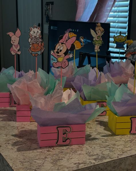 Make your little one’s celebration magical with custom Disney baby centerpieces! Perfect for baby showers and first birthdays, these adorable creations will bring a touch of enchantment to your special day. 🍼✨ . . #HandmadeWithLove #SmallBusiness #CraftyCreations #SupportSmallBusiness #CustomMade #CraftBusiness #EtsyShop #UniqueFinds #ArtisanCrafts #MadeByHand #ShopLocal #CraftyCommunity #SmallBizLove Centerpieces For Kids Party, Disney Centerpieces, Mickey Mouse Centerpieces, Toddler Parties, Simple Centerpieces, Birthday Centerpieces, Disney Concept Art, Minnie Mouse Party, Diy Centerpieces