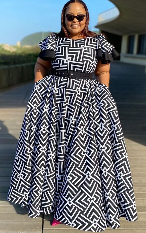 #USA  #fashioninspo #fashionidea #fashioncasual #fashionrebellen #fashionableclothes #fashionablefitness #fashionably #fashiongirl #fashionshop #fashionaesthetics  #stylegoals #trendythreads #fashionblogger #stylegoals #trendythreads  #styleinspiration #instafashion Black And White African Print Dresses, Chitenge Dresses Pattern, African Maxi Dresses Classy, Setswana Wedding, Makoti Dresses African Women, Setswana Traditional Dresses, Shweshwe Dresses Patterns, African Print Long Dress, South African Traditional Dresses