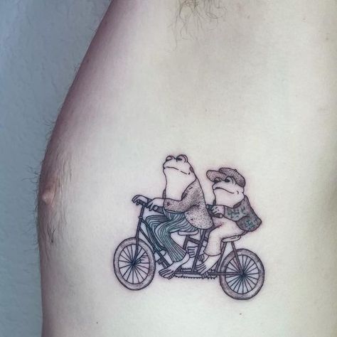 Izabella Tattoo Artist on Instagram: "FROG AND TOAD! I love this couple. There’s a super cute tiktok I made at the very end. I think I’m getting better at making them! Thank you @chasecaldwell__ for bringing me such a fun design and for staying so still! . . . #tattoo #tattoos #tattooart #tattooartist #tattooartists #atxtattoo #austintattooartist #finelinetattoo #finelinetattoos #frog #frogs #toad #frogandtoad" Frog And Toad Tattoos, Toad Mushroom Tattoo, Frog And Toad Matching Tattoo, 90 Tattoo Ideas, Triassic Cuddle Tattoo, Matching Frog Tatoos, Party Frog Tattoo, Frog Couple Tattoo, Rain Frog Tattoo