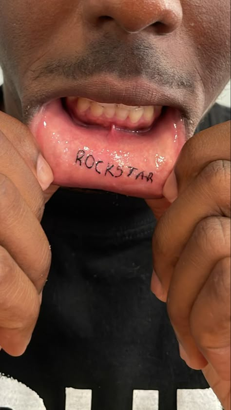 Tattoos Of Celebrities, In Lip Tattoo, Star Lip Tattoo, Inside Lip Tattoos Ideas, Mouth Tattoo Inner Lip, Lower Lip Tattoo, Tattoo On Lip, Inner Lip Tattoo Words, Underlip Tattoo