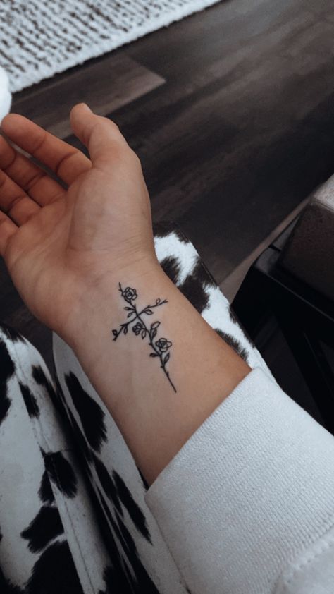 Small Cross And Flower Tattoo, Tattoo Ideas Cross With Flowers, Womens Cross Tattoo With Flowers, Cross Of Flowers Tattoo, Flower With Faith Stem Tattoo, Small Cross Flower Tattoo, Tattoo Ideas Cross Flowers, Cross W Flowers Tattoo, Crosses With Flowers Tattoo