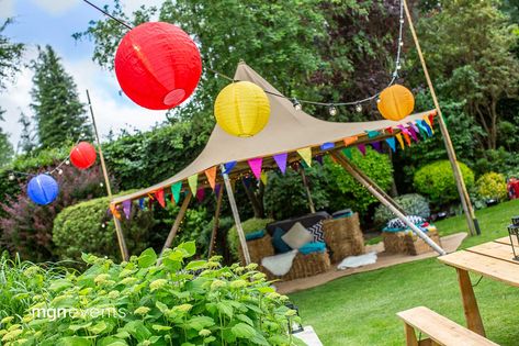 Our client’s garden proved a perfect setting for their festival-themed 40th birthday party. A large tipi tent created a dance area & several smaller tipis became shaded chill-out areas. A range of street food stalls provided the catering & created a great sense of theatre as the food was freshly prepared in front of guests. As night fell the festoon lighting & colourful lanterns created a lovely atmosphere & signified that the party wouldn’t be stopping any time soon! #PartyByMGN Garden Festival, Festival Themed Party Birthday, Festival Themed Party Decorations, Wedding Fest, Festival Themed Party, Garden Party Decorations, 21st Party, Festival Theme, Family Fun Day