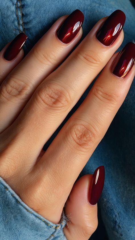 Get inspired by these gorgeous red fall nails for 2024 From dark cherry to chrome wine almond and more find stunning designs for short nails Whether you prefer a daring or chic look these nail designs will have you feeling fabulous Shiny Maroon Nails, Nail Cherry Red, Fall Red Nails 2024, Chrome Wine Nails, Deep Red Nails Almond, Chocolate Cherry Nails, Wine Nails Short, Cranberry Chrome Nails, Red Short Almond Nails