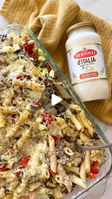 Jacqueline Vignona | Easy & Delicious Recipes on Instagram: "#ad Baked Ziti with Bertolli® d’Italia Four Cheese Alfredo Sauce made in Italy for your next pasta night!

This dish could not be easier or more delicious! It’s made with Bertolli d'Italia Four Cheese Alfredo Sauce. These sauces are made from fine Italian cheeses & fresh cream for authentic & delicious flavor! You only need a few ingredients to make this dish & dinner can be on the table within 30 minutes!

To make it fill a baking dish with one 12 ounce box of cooked penne pasta. Next, pour one jar of @bertolli_us Four Cheese Alfredo Sauce & mix well. Then add 2 cups of cooked ground beef, 1 diced red bell pepper, 1 diced zucchini & top with 1 cup of shredded mozzarella. Bake at 350° for 20 to 25 minutes or until the cheese has Bertolli Alfredo Recipes, Cheese Alfredo Sauce, Mozzarella Bake, Penne Pasta Recipes, Pasta Night, Italian Cheese, Alfredo Recipe, Baked Ziti, Fresh Cream