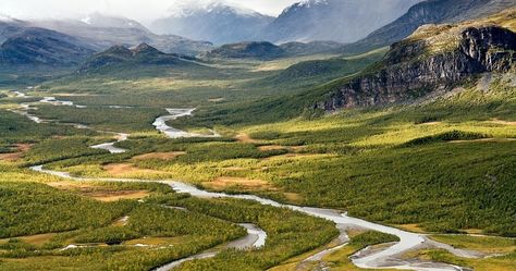 The Rapa River (also called Rapaätno) flows through the Sarek National Park, winding through magnificent mountain ranges and narrow valleys,... Chile Travel, Sweden Travel, River Delta, Helicopter Ride, Mountain Ranges, Backpacking Europe, Landscape Pictures, Europe Travel Tips, America Travel