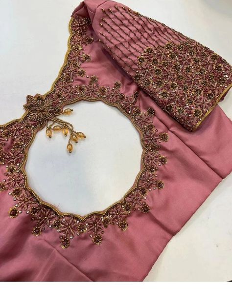 Dm@96404 90158 ## Designer Maggam Work Blouse ### Fabric Options: - Halfpattu - Raw Silk ### Dispatch Time: - Ready for dispatch in 3 days ### Pricing: - ₹2300(Unstitched) - ₹2850 (Stitched) ### Customization: - Available in various colors and sizes as per your preference Our designer maggam work blouse offers the perfect blend of traditional craftsmanship and contemporary style, ensuring you stand out at any event. Pink Blouse Designs For Saree Silk Aari Work, Maggam Work Blouse Designs Bridal Heavy, Pink Aari Work Blouse Designs, Blouse Hand Work Designs, Wedding Blouse Designs Bridal Collection, Neck Design Back, Wedding Blouse Design, Pink Blouse Design, Paneer Starters