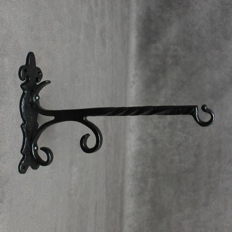 We make high quality Cast Iron Brackets for Hanging Baskets and Fire Bucket Brackets. Buy easily online now. Wizard Library, Sign Hanger, Metal Plant Hangers, The Garden Room, Hanging Basket Brackets, Flower Pot Ideas, Court Yard, Fresh Farmhouse, Wrought Iron Decor