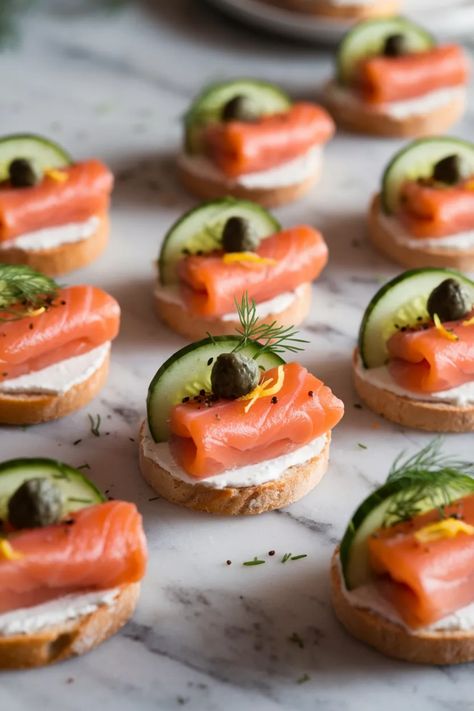 A photo of a  Elegant Smoked Salmon Canapés a New Years Eve Food Party Ideas Smoked Salmon Creme Fraiche Appetizer, Smoked Salmon Party Food, Salmon Board Ideas, Smoked Salmon Charcuterie Board Ideas, New Year's Eve Food Ideas, Food Ideas For New Years Eve Party, Smoked Salmon Charcuterie Board, Cold Canapes Ideas, Christmas Canapes Ideas